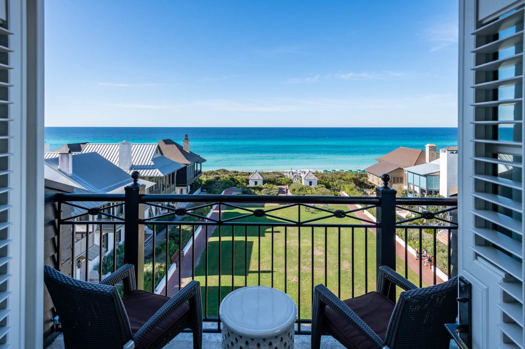 The Pearl Hotel guest room with a balcony and view of Rosemary Beach and the Gulf of Mexico